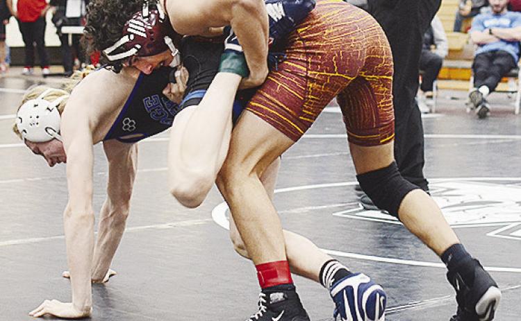 Tristan Cardenas attempts to control his opponent during the regional tournament last weekend in Weatherford. CDN | Sam Goodwyn