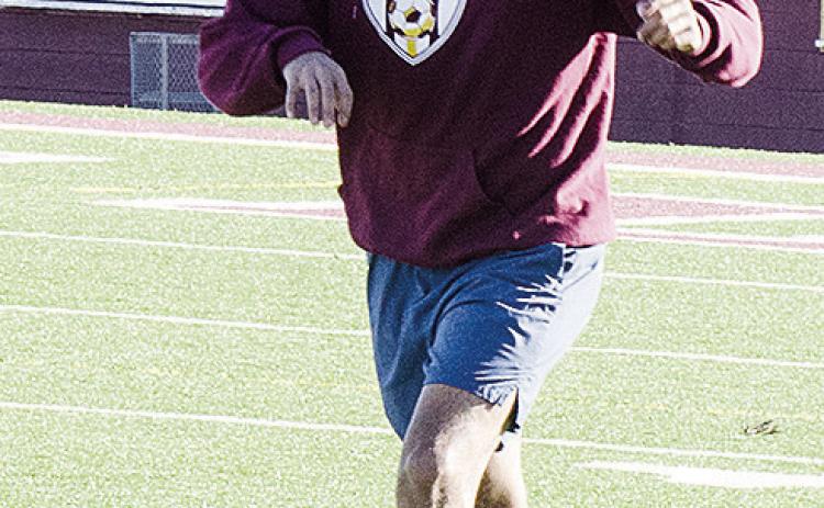 Ruben Labastida looks for a teammate during a recent Clinton soccer practice. CDN | Sam Goodwyn