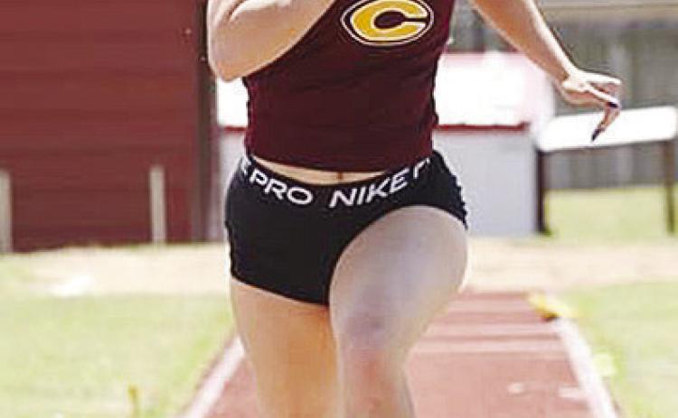 Clinton’s Presley Evans practices her long jump during a recent practice in prepartion for the new track and field season. CDN |Courtesy Photo