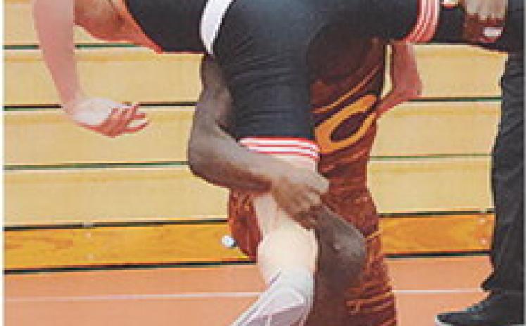 CHS wrestling brings home conference title