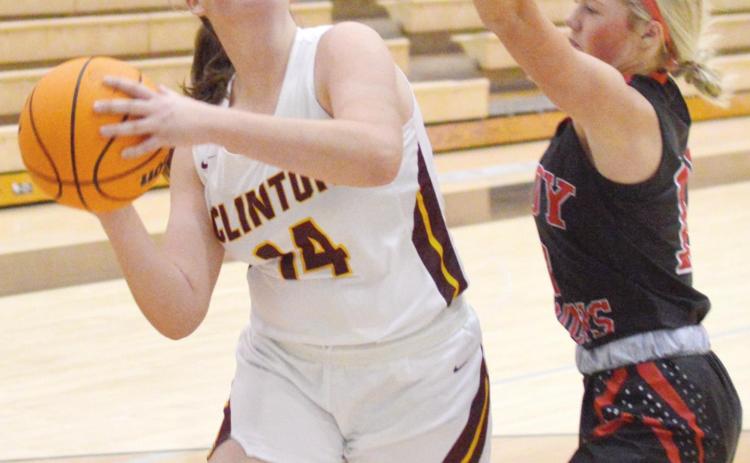 Lady Reds shine in clutch, advance