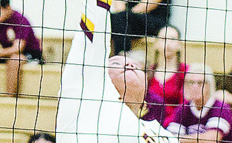 Clinton’s Aracelie Chavez hits the ball over the net during the Lady Reds’ road game against Weatherford. CDN | Sam Goodwyn