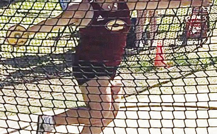 Clinton’s Marley Gamboa hurls the discus during the Class 4A Regional Track and Field Meet over the weekend in Chisholm. CDN | Courtesy Photo