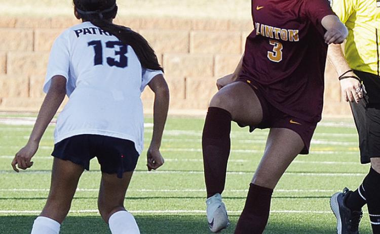 Clinton’s No. 3 Alyson Lopez avoids a Putnum City West player as she changes directions in the home win over the Lady Patriots. CDN | Sam Goodwyn