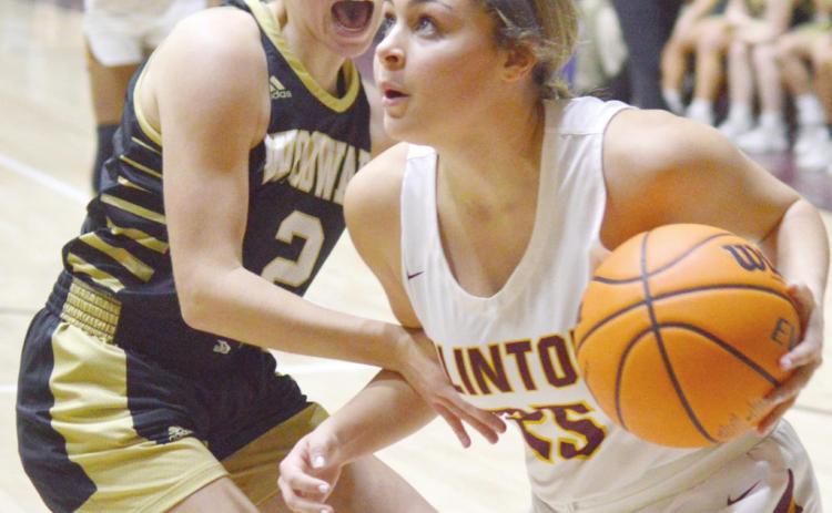 Lady Reds stifle Woodward in win