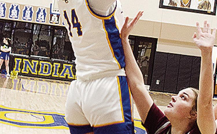 Arapaho-Butler’s Peyton Lambeth, left, shoots over the Sayre defender during the Lady Indians’ win over the Lady Eagles Thursday in the first round of the Western Equipment Classic. CDN | Sam Goodwyn