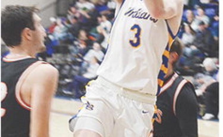 No. 3 Jiles Southall leaps in the air as he attempts a layup over a defender during A-B’s third-place game against Cheyenne-Reydon in the Western Equipment Classic. CDN | Sam Goodwyn