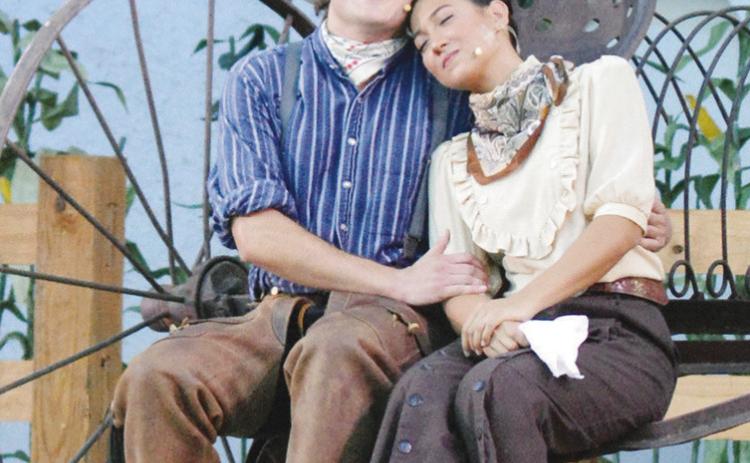 Wesley Javorsky as Curly, left, performs next to Angela Nichols as Laurey for “Oklahoma!” at the R.A. “Dick” Lloyd Amphitheater. CDN | Christian Jacobsen