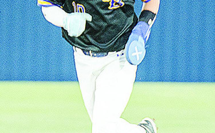 Arapaho-Butler’s Jack Goldsberry sprints to third base during the Indians’ win Thursday over Fletcher at home. CDN | Sam Goodwyn