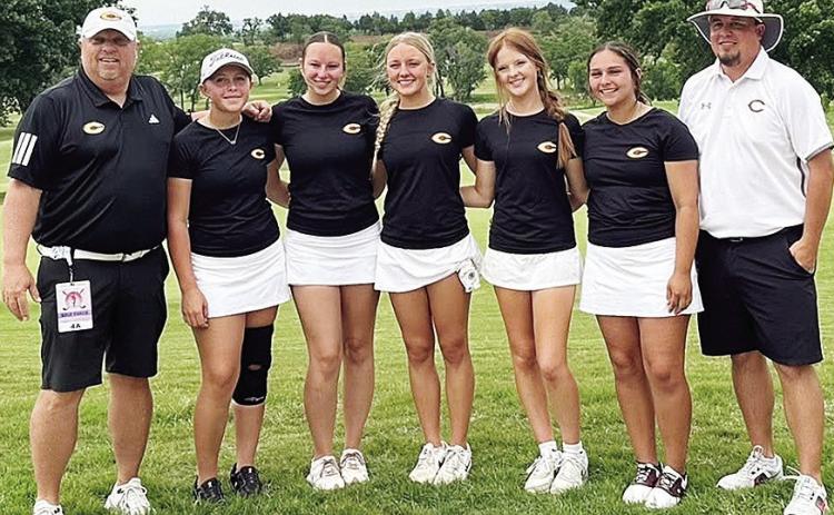 The Clinton Lady Reds golf team comes together following its performance in the recent Class 4A State Tournament at Dornick Hills Country Club. Pictured, from left, are Coach Brent Caldwell, Emma Ray, Paige Pugh, Jocelyn King, Bella Bridgeman, Tatum Fanshier and Coach Trevor Powers. CDN | Courtesy photo
