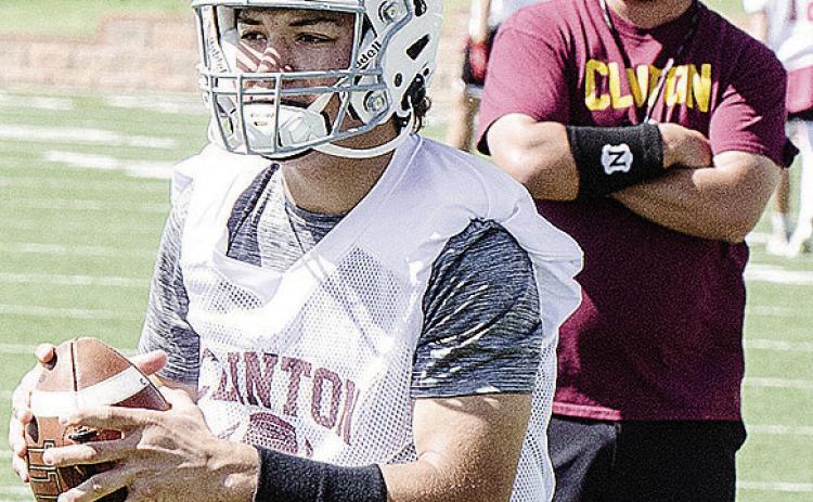 Easten Powell, front, gets watched by Head Coach Trevor Powers during 7-on-7 at the Tornado Bowl. CDN | Sam Goodwyn
