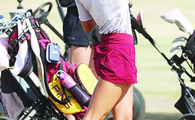 Rylee Cummins stares down the ball after hitting it during a tournament this year. CDN | Sam Goodwyn