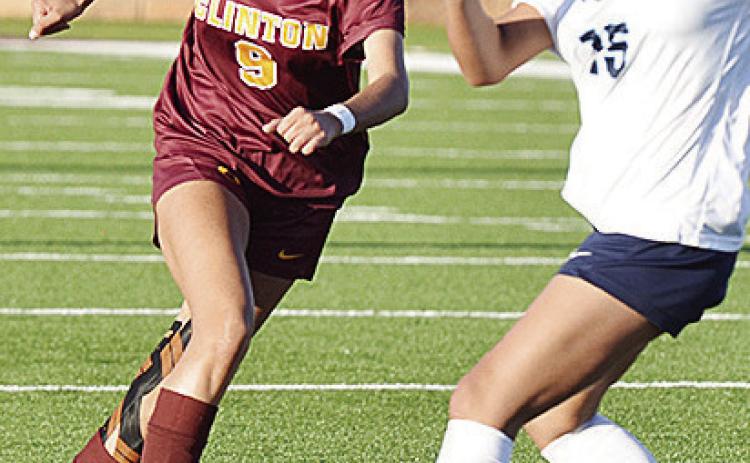 Clinton’s No. 9 Jimena Solis changes direction to avoid the Putnam City West defender in the Tornado Bowl. CDN | Sam Goodwyn