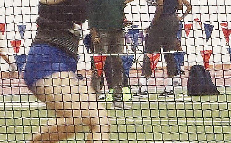 Kat Meacham performs in the weight throw over the weekend during the Bob Timmons Challenge at the University of Kansas. CDN | Courtesy photo