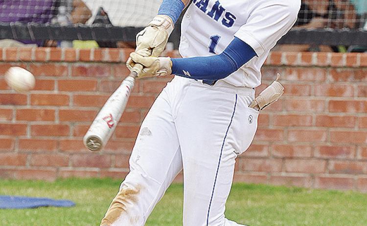 A-B’s Rylan Moore smacks the ball for a two-run home run Saturday during the Indians’ season-opening home win over Vici. CDN | Sam Goodwyn