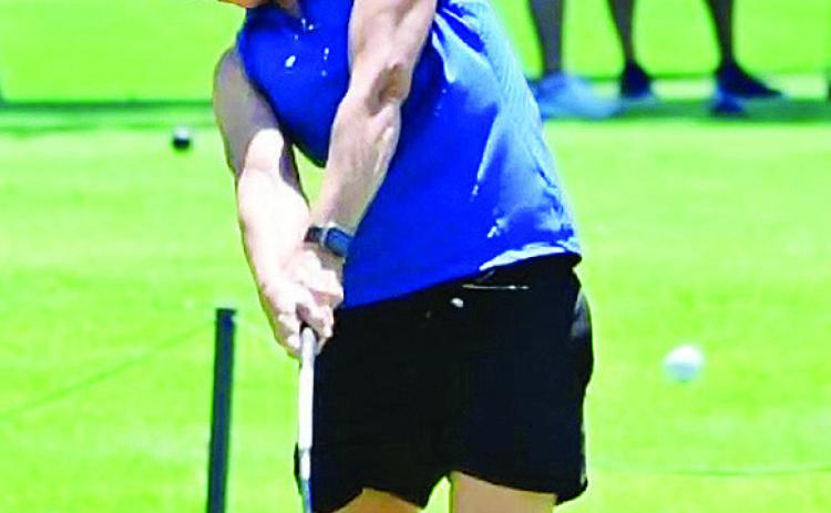 New Lady Reds golf coach Tasha Marshall hits a ball during a 2023 tournament in Elk City. CDN | Courtesy photo