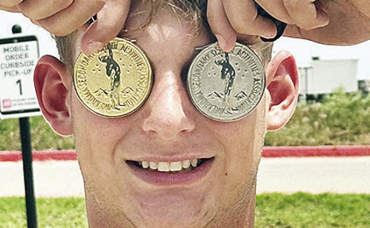 Clinton’s Wyatt Willoughby shows off his two state medals he won during the Class 4A State Track and Field Meet this weekend in Ardmore. CDN | Courtesy photo