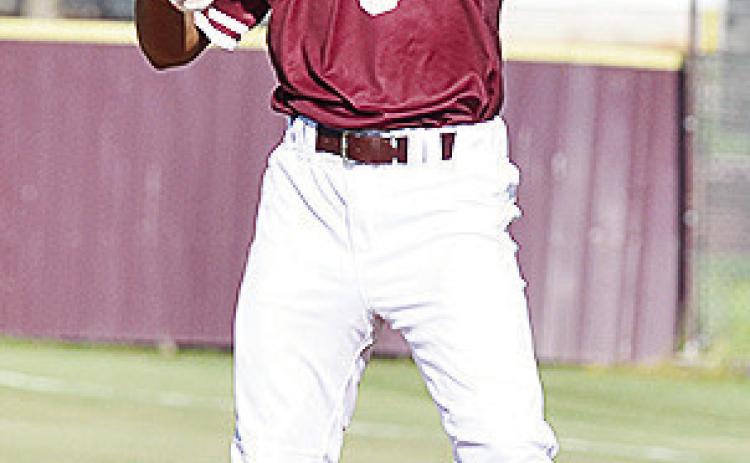 Clinton’s Jesus Gutierrez prepares to pitch against Arapaho-Butler. CDN | Sam Goodwyn