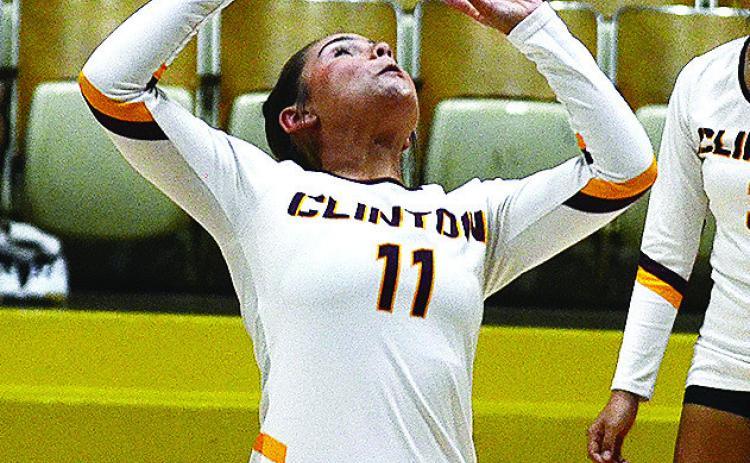 Clinton’s Ali Fuentes sets the ball during the Lady Reds’ JV game against Weatherford in the Tornado Dome. CDN | Sam Goodwyn