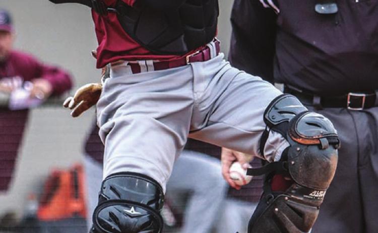Tate Wilhelm hops to his feet