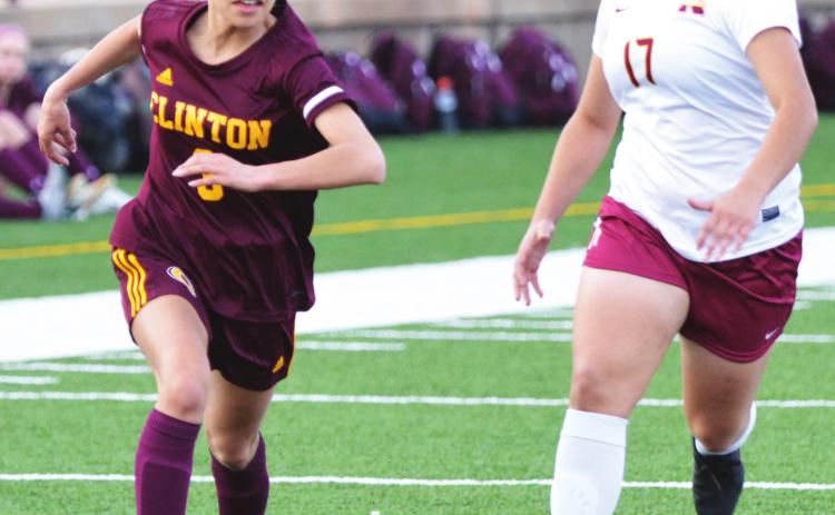 Lady Reds stay perfect with 10-0 win