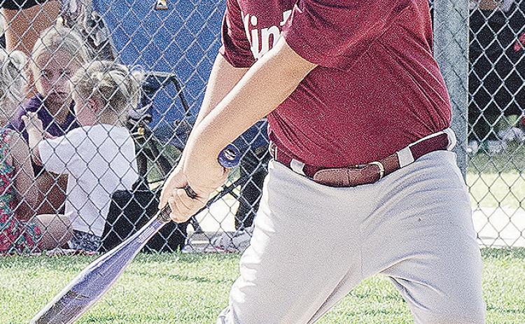 Santiago Vazquez keeps his eye on the ball during Clinton’s baseball game in the OK Kids 8U Baseball State Tournament at Schumacher Fields at Acme Brick Park. CDN |Sam Goodwyn