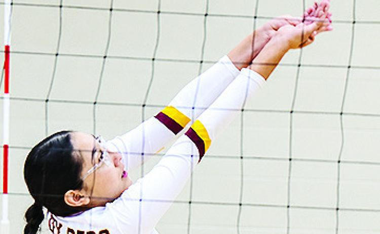Jocelyn Lagunas sends the ball back over the net during Clinton’s match-up on the road against Weatherford. CDN | Sam Goodwyn