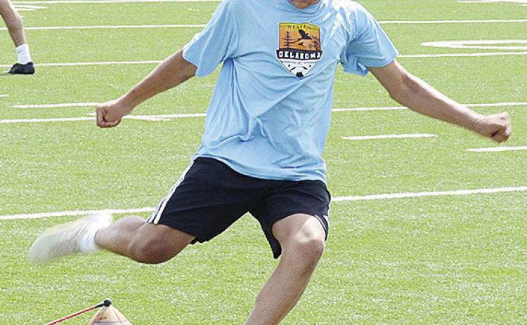 Clinton’s Ruben Martinez practices kicking field goals during practice Monday in the Tornado Bowl. CDN | Sam Goodwyn