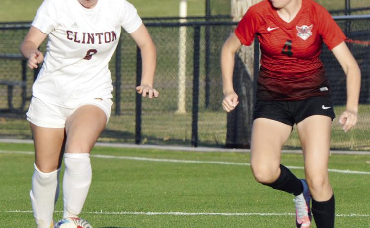 CHS soccer teams split at Woodward