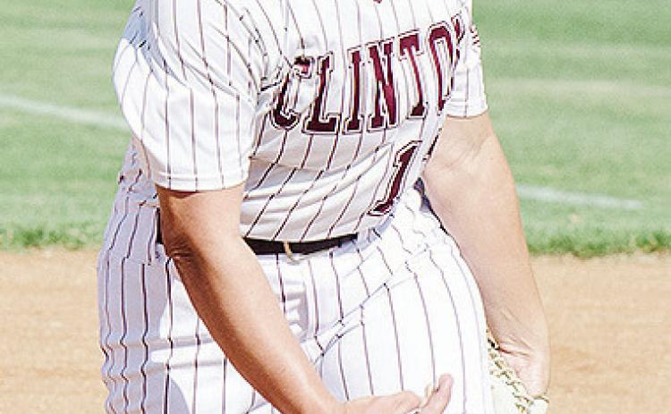 Clinton’s Emma Ray hurls the pitch during the Lady Reds’ home game against Altus. CDN | Sam Goodwyn