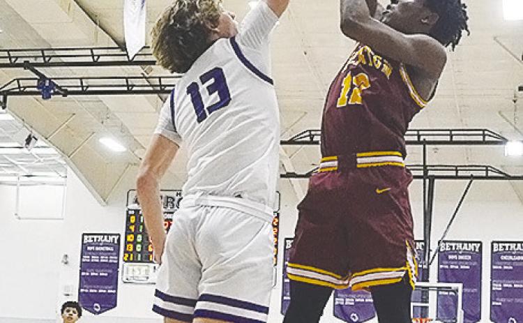 Reds drop first game of hoops playoffs in Bethany