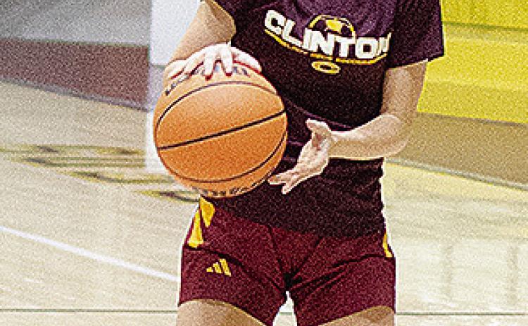 Clinton’s Rhylee Chagolia aims the basketball as she prepares to shoot it during basketball practice in the Tornado Dome. CDN | Sam Goodwyn