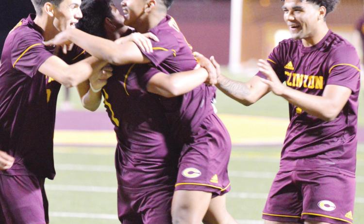 Clinton advances to quarterfinals