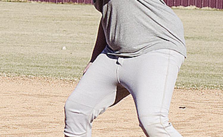 Dustin Hoffman catches the ball at first for the out during baseball practice. CDN | Sam Goodwyn