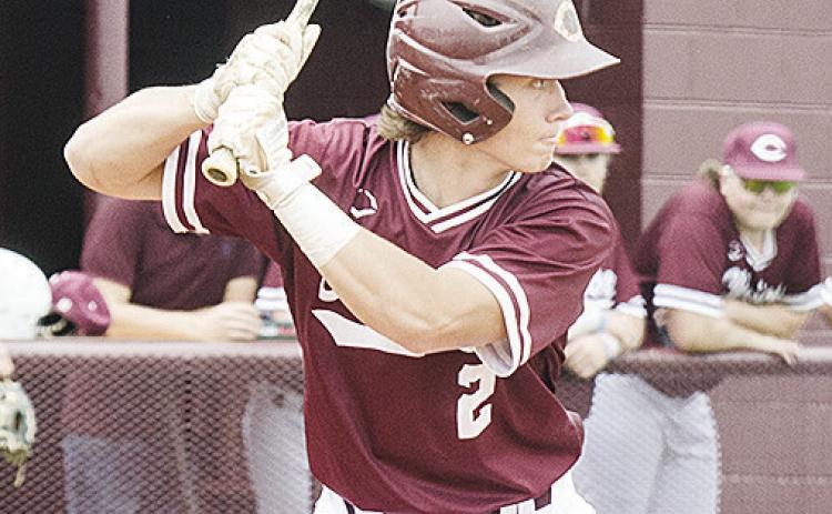 Vince Jones focuses on the pitcher as he prepares to swing during Clinton’s home baseball game against Elk City. CDN | Sam Goodwyn
