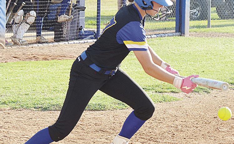 A-B’s Dalaynie Lee bunts during the Lady Indians’ season-opening win at home over Merritt Monday. CDN | Sam Goodwyn