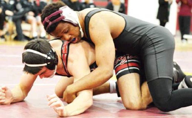 Wrestling places three, finishes eighth at Blanchard