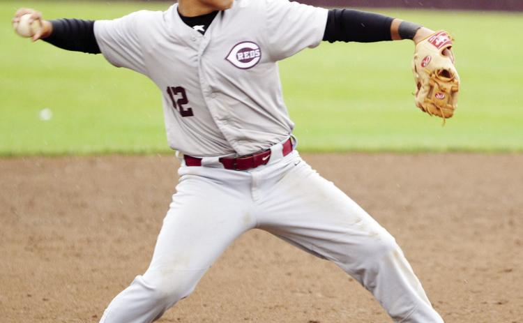Reds win to advance to regionals