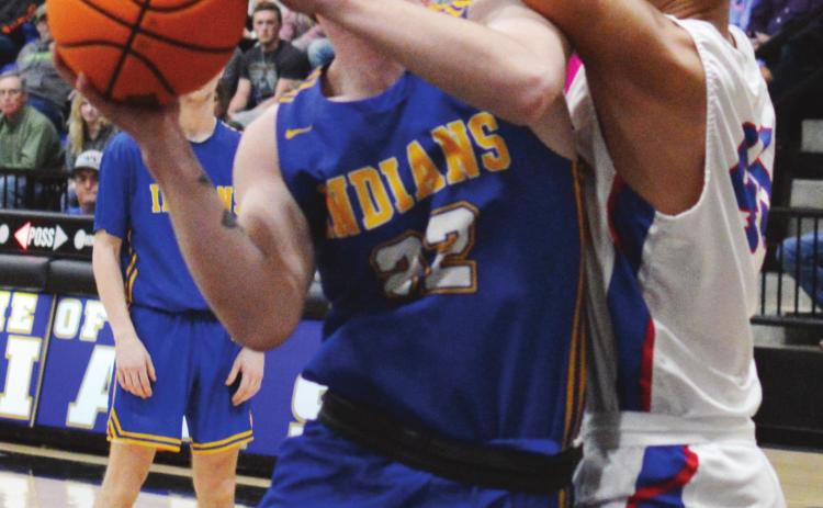 CDN | Collin Wieder � Arapaho-Butler senior post Zach Carlisle fights for position down low against Hammon earlier this year. Carlisle scored eight points in the state tourney opening win against Hydro-Eakly.