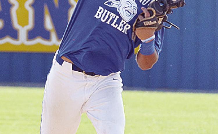 Arapaho-Butler’s Orsan Jubara throws the ball with all of his might to first for the out during the Indians’ game against Clinton. CDN | Sam Goodwyn