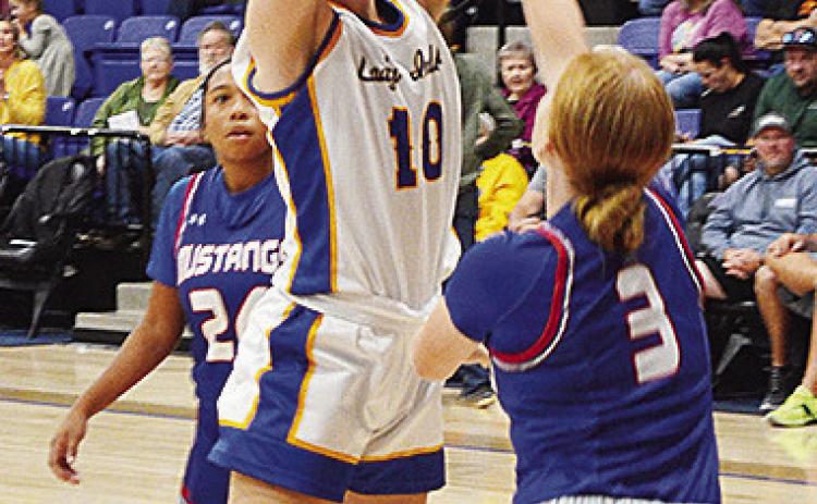 Arapaho-Butler’s Katelyn Garibay lays the ball up over a defender during the Lady Indians’ home game against Fort Cobb. CDN | Sam Goodwyn