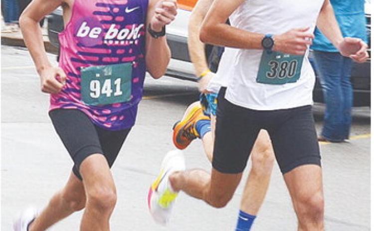 Clinton’s Bentlee, left, and Xadrian Hernandez take off from the starting line during the Clinton Classic Run Saturday morning. Bentlee took gold in the 5K race, while Xadrian finished first in the 10K race. CDN | Sam Goodwyn