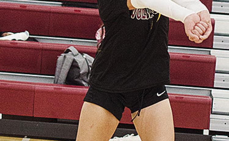 Jocelyn Lagunas hits the ball back over the net Thursday during a summer practice. CDN | Sam Goodwyn
