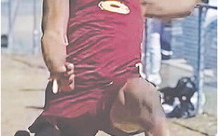 Clinton’s Marquis Martin flies through the air during the long jump event as a part of the track and field meet Monday at Plainview. CDN | Courtesy photo