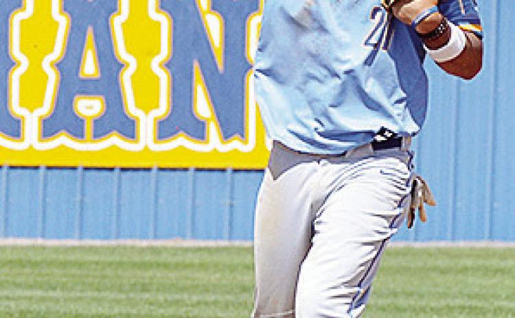 No. 21 Orsan Jubara throws the ball toward third during A-B’s game against the Terriers. CDN | Sam Goodwyn