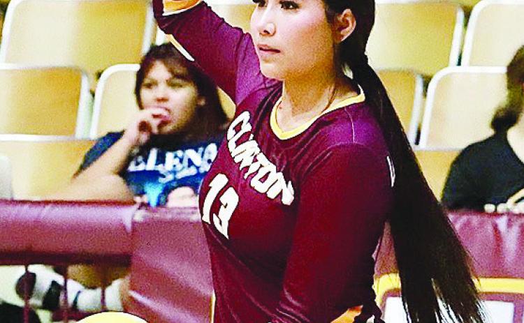 Senior Danna Mendieta prepares to serve the ball during Clinton’s game against Blair in the Tornado Dome. CDN |Keri Staggs