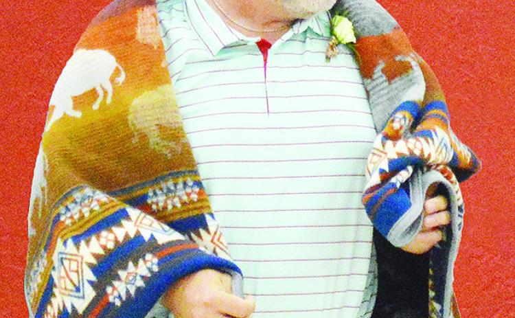 Brandon Lee, president of the Oklahoma Funeral Directors Association, was honored with a blanket by the Cheyenne and Arapaho Tribes Saturday at the Clinton ERC Building. CDN | Micah Ashcraft