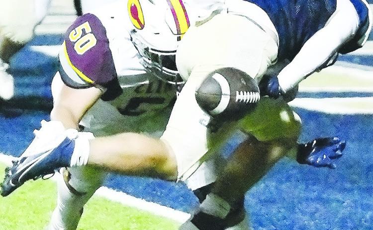 Clinton’s No. 50 Alex Amaya forces a fumble at the goal line during the Red Tornadoes’ road loss Friday to Kingfisher. CDN | John Kinsey