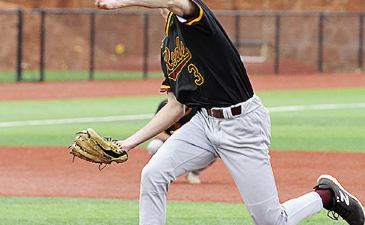 Clinton’s Craig Hunter hurls a fastball during the Reds’ road game in Elk City Monday. CDN | Sam Goodwyn