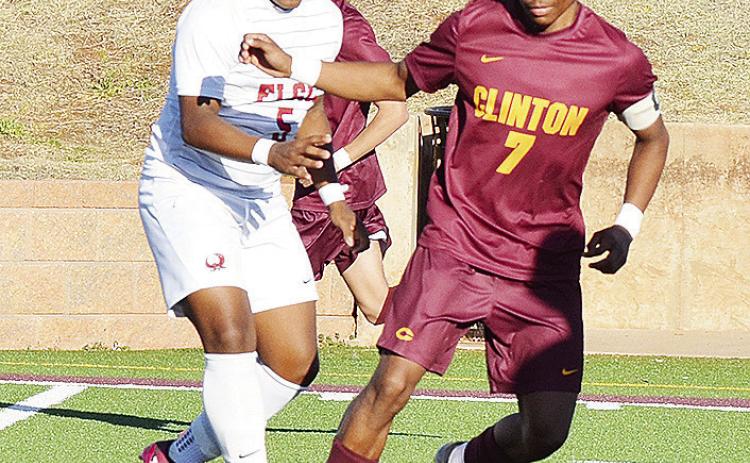 Clinton’s No. 7 Deontray Beavers battles with an Elgin defender during the Red Tornadoes’ home win over the Owls in the Tornado Bowl. CDN | Sam Goodwyn